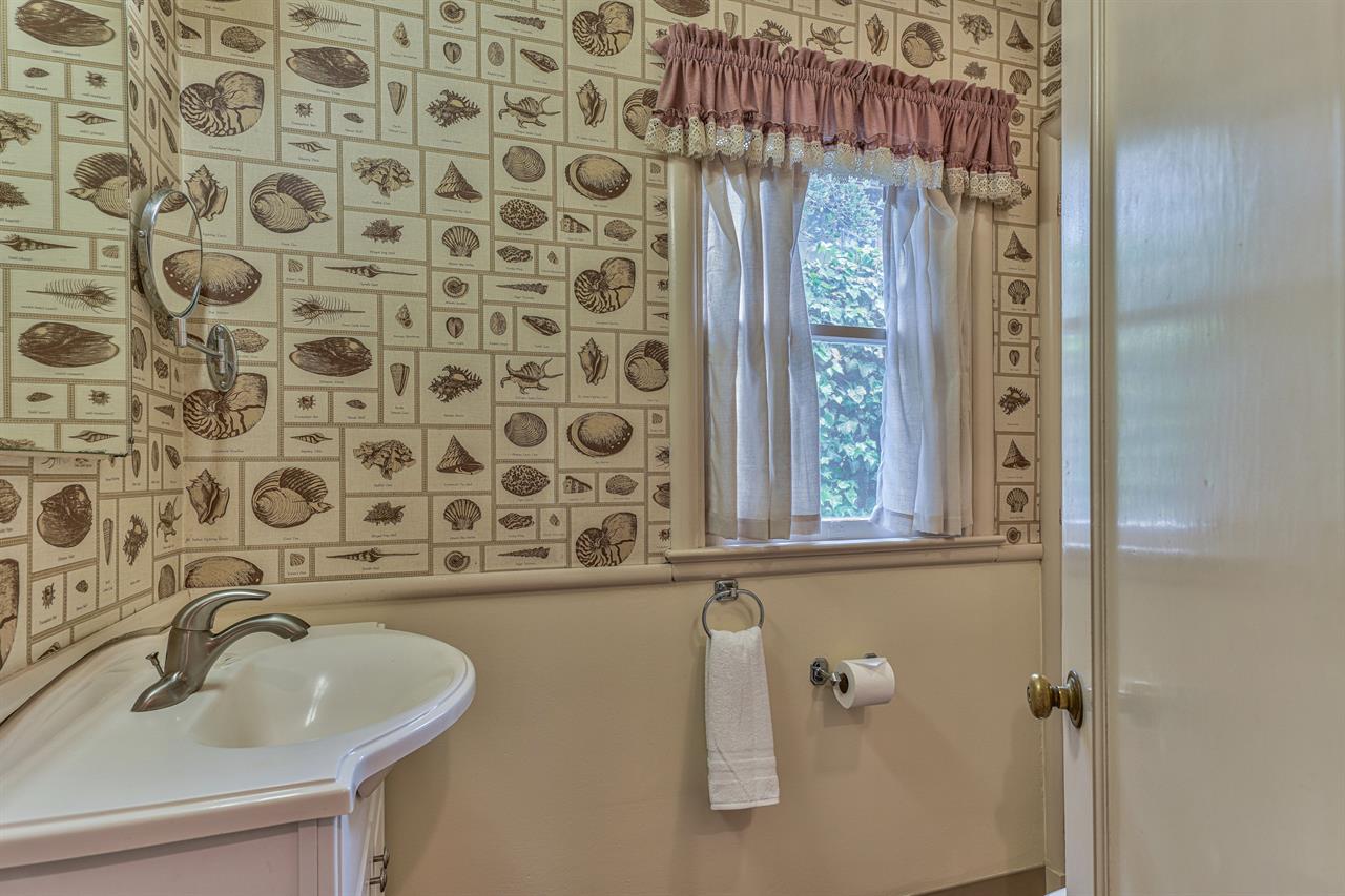 Bathroom 2 with a Standing Shower and Whimsical Wallpaper