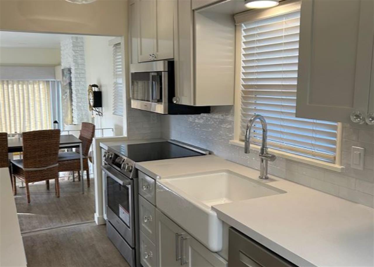 Updated Kitchen with Stainless Steel Appliances, Farmhouse Sink