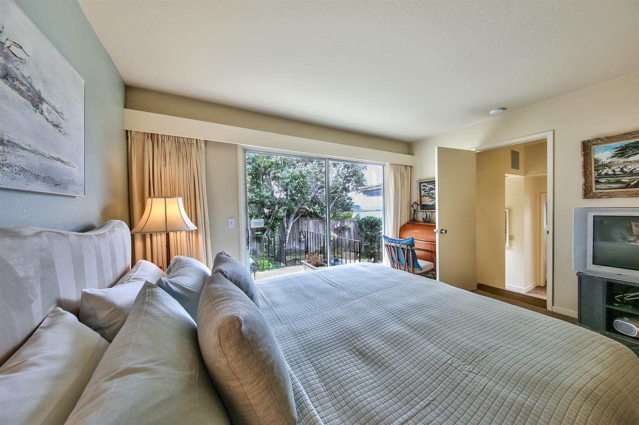 Bedroom 1, King Bed, Patio  Access, TV, Desk, En Suite