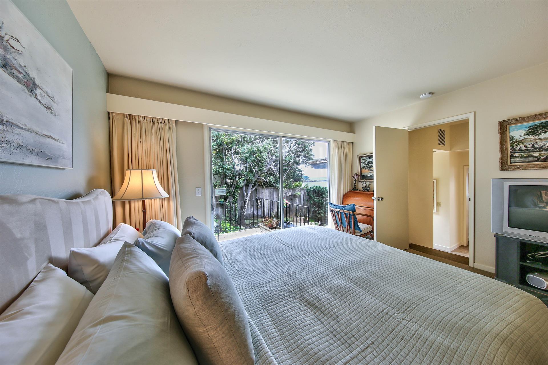 Bedroom 1, King Bed, Patio  Access, TV, Desk, En Suite