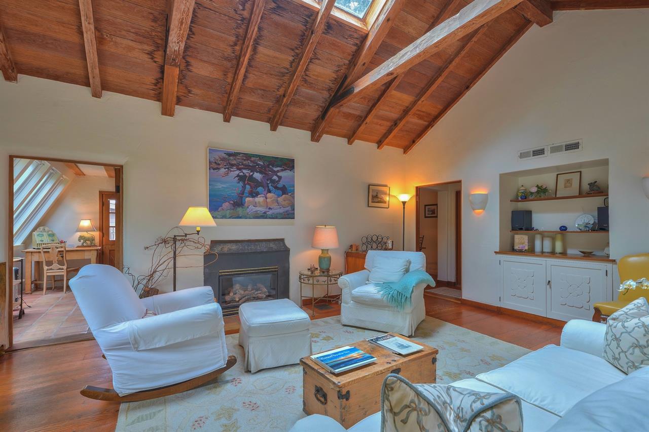 Living Room with French Doors, Wood Floors, Lofty Ceiling