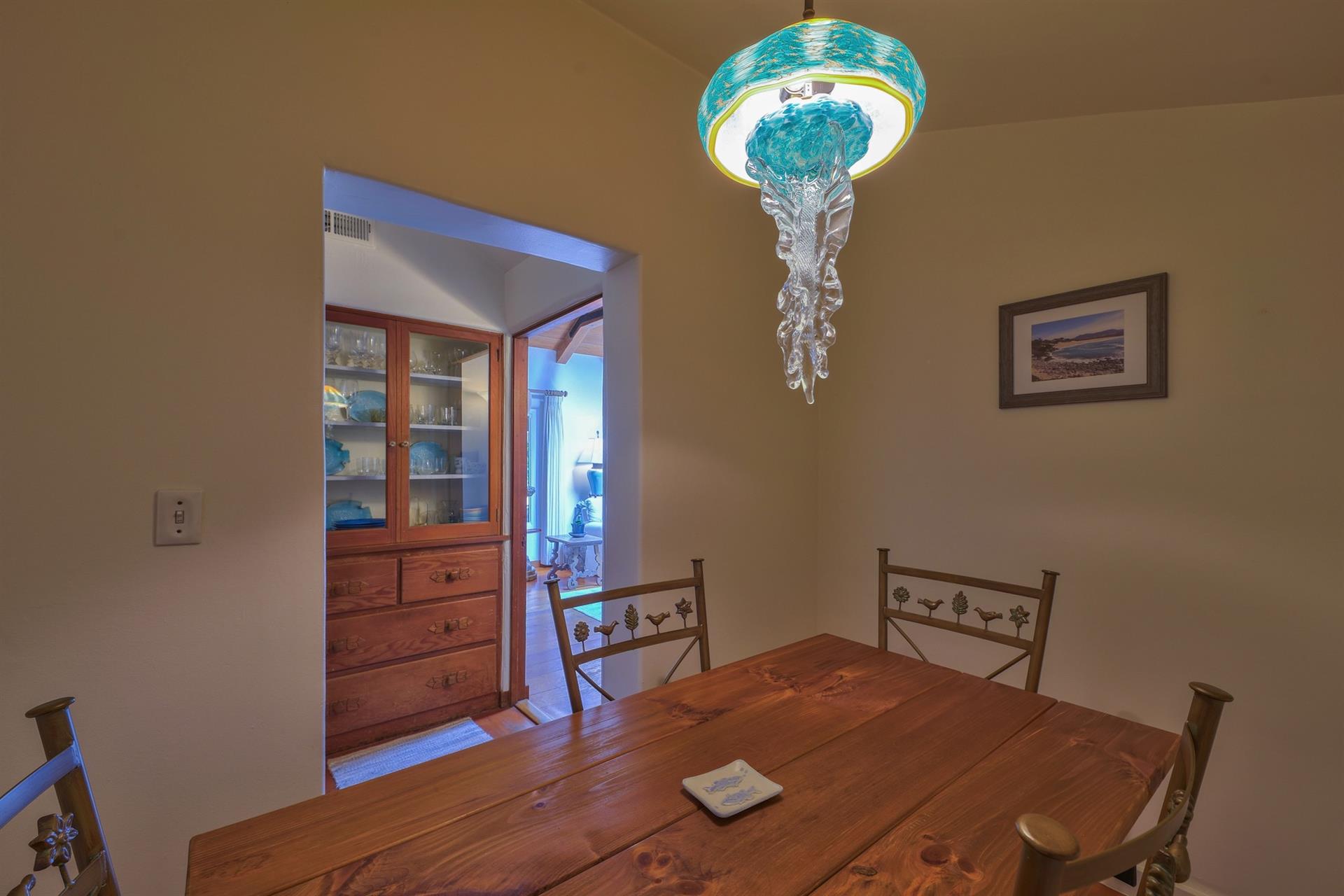 Dining Nook with Glass Jellyfish Light Fixture
