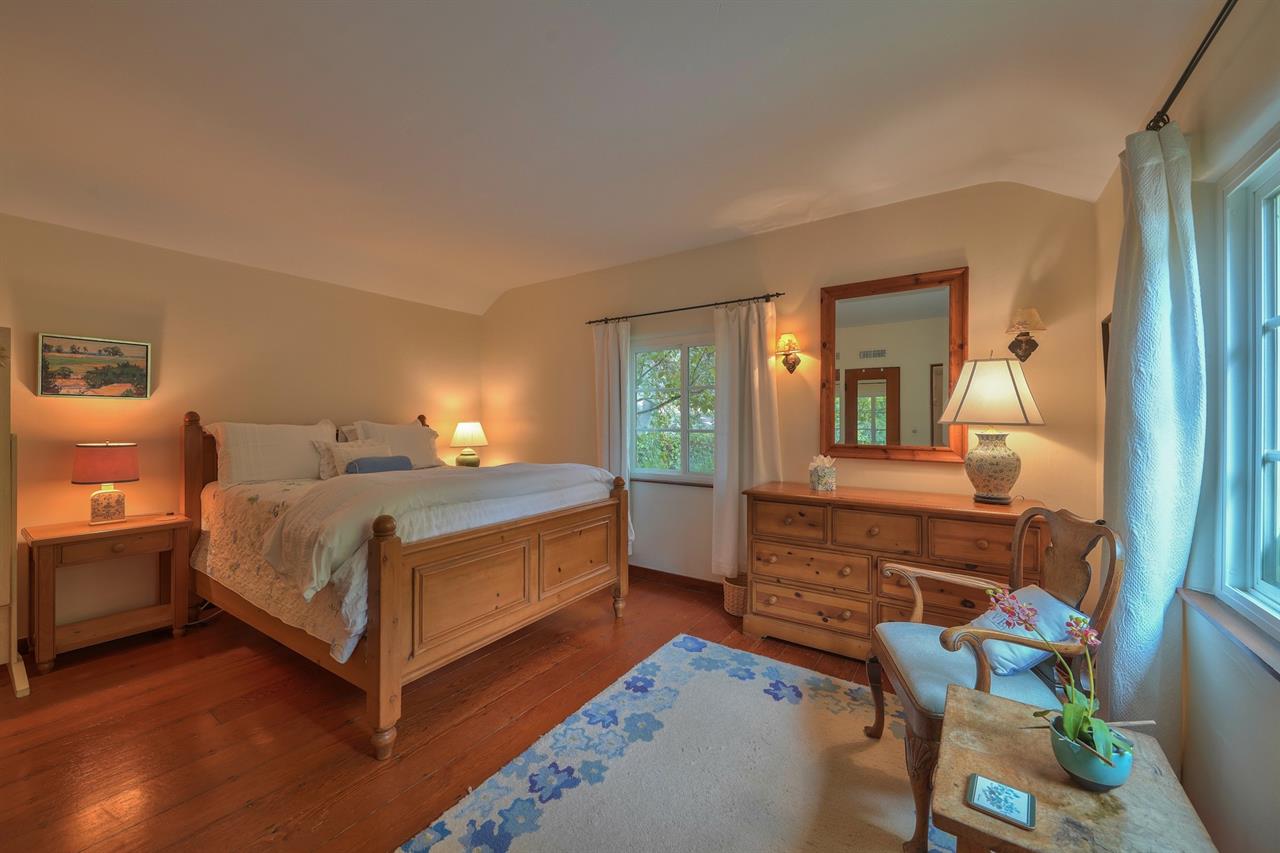 Bedroom 1, Queen Bed and Garden Views