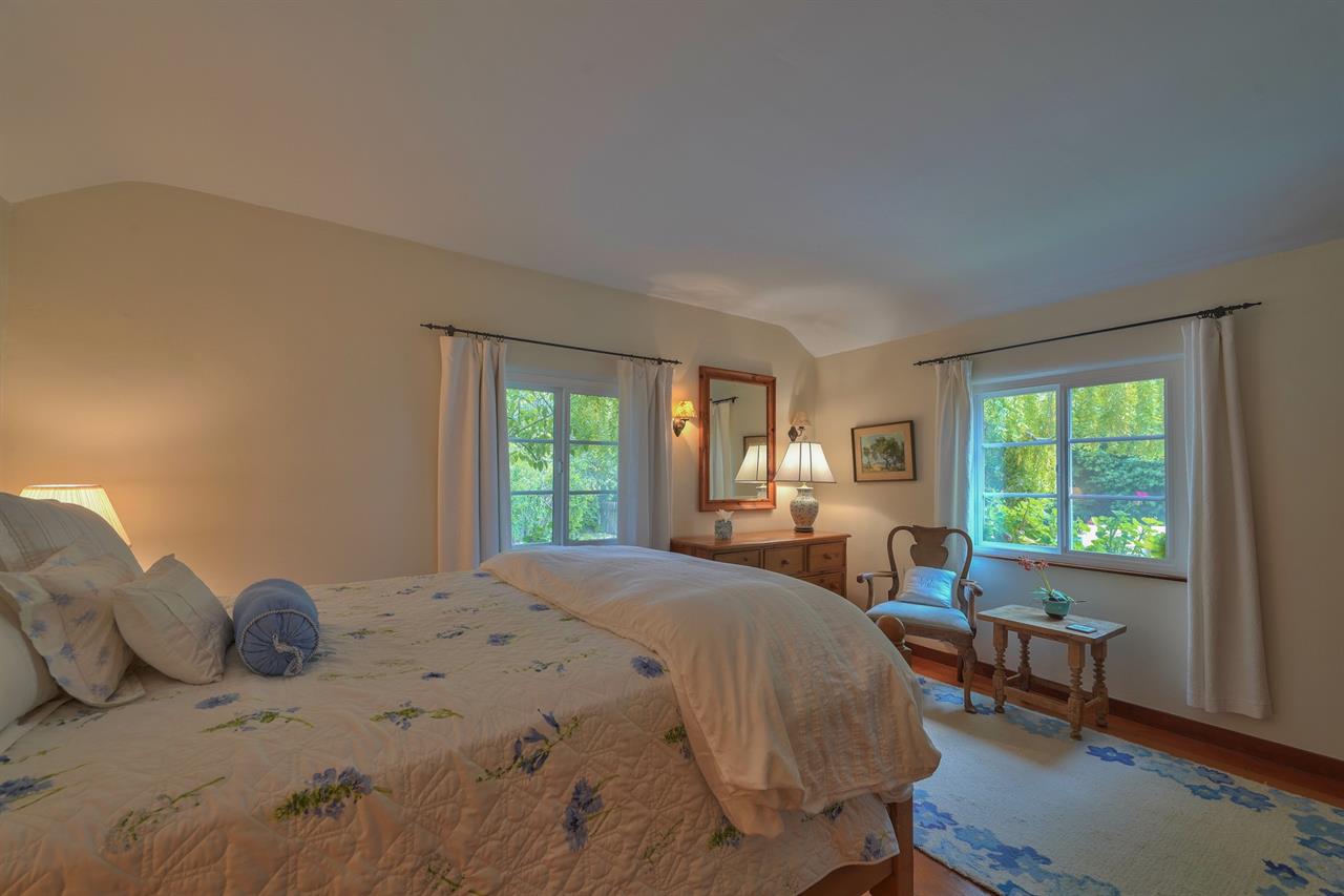 Bedroom 1, Queen Bed and Garden Views