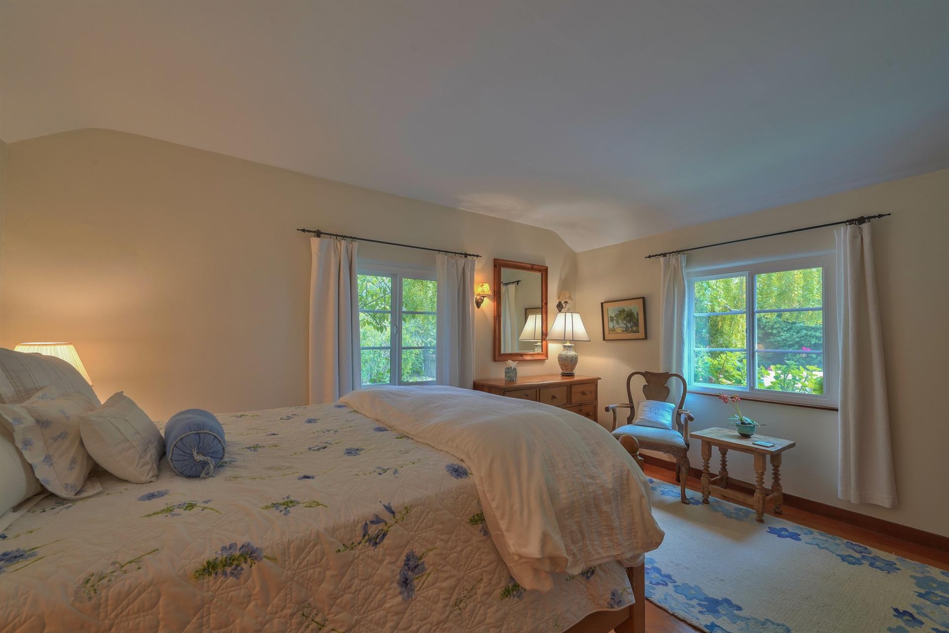 Bedroom 1, Queen Bed and Garden Views