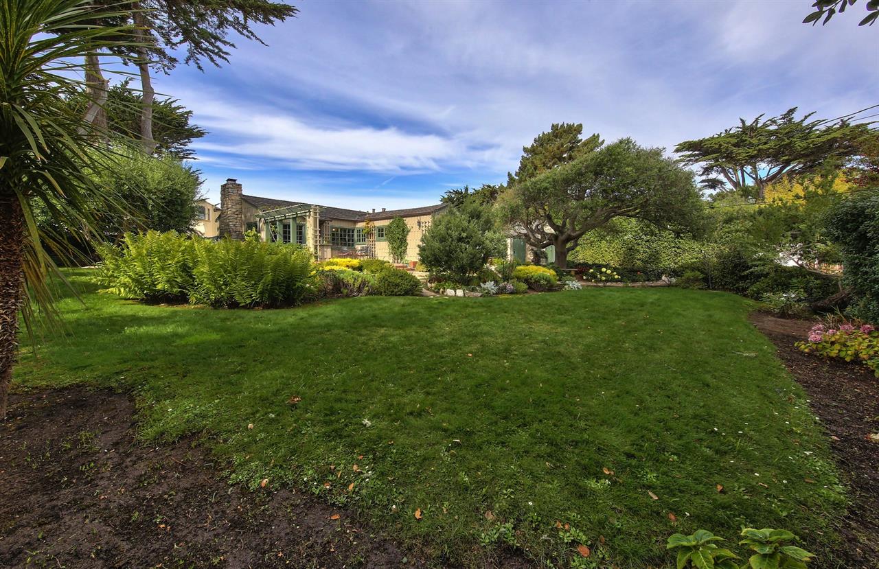 Verdant Gardens Surround this Quaint Home
