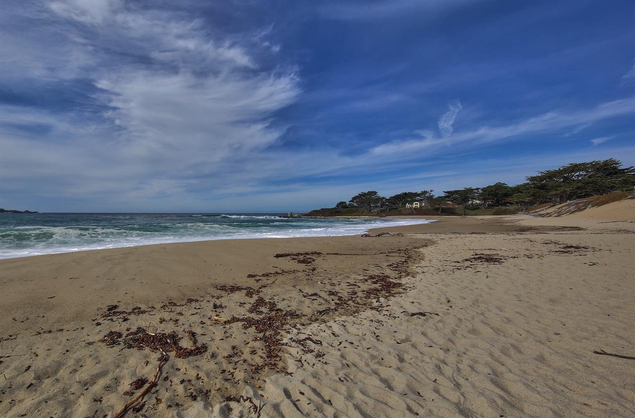Located a Short Walk to Sandy Beaches