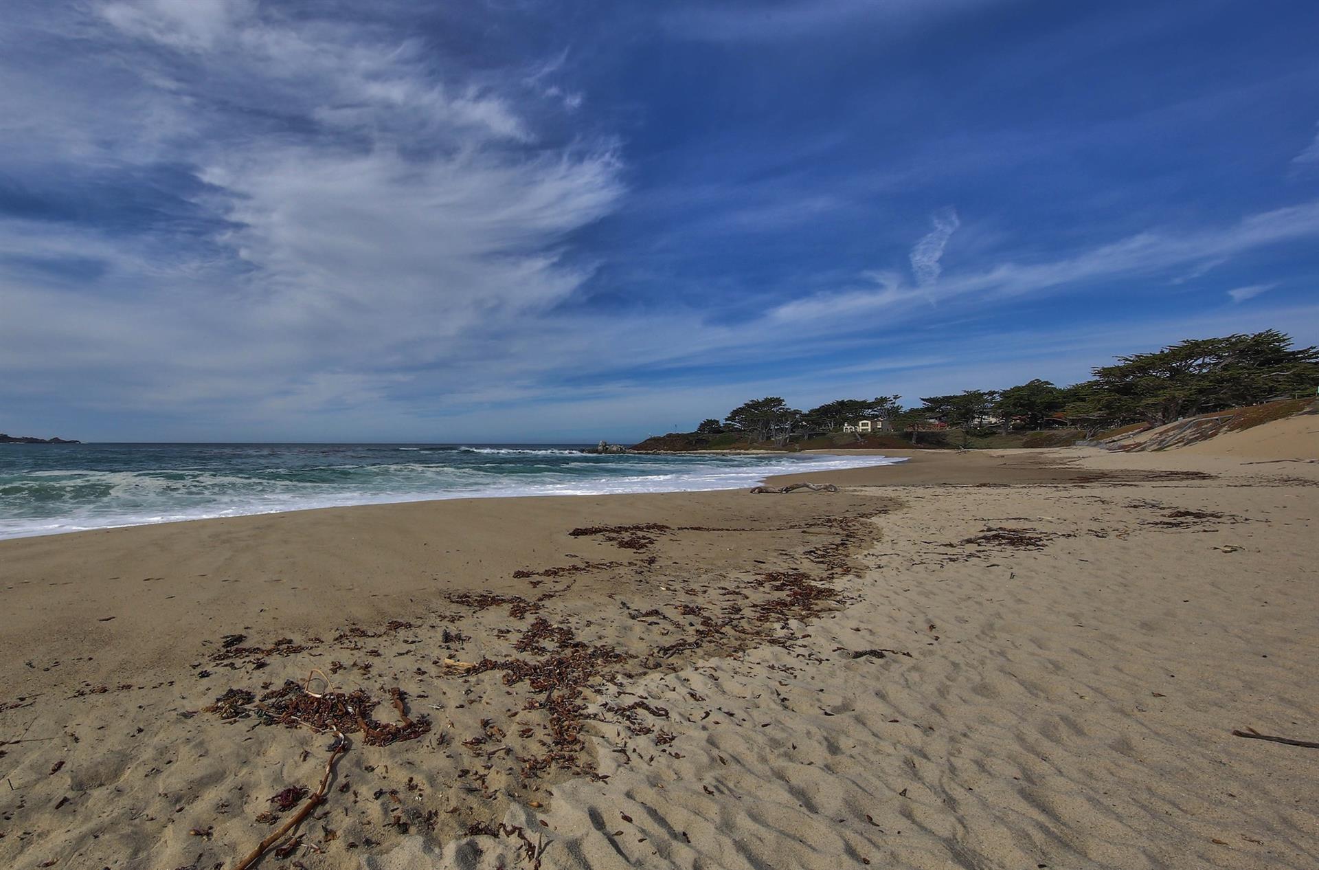 Located a Short Walk to Sandy Beaches