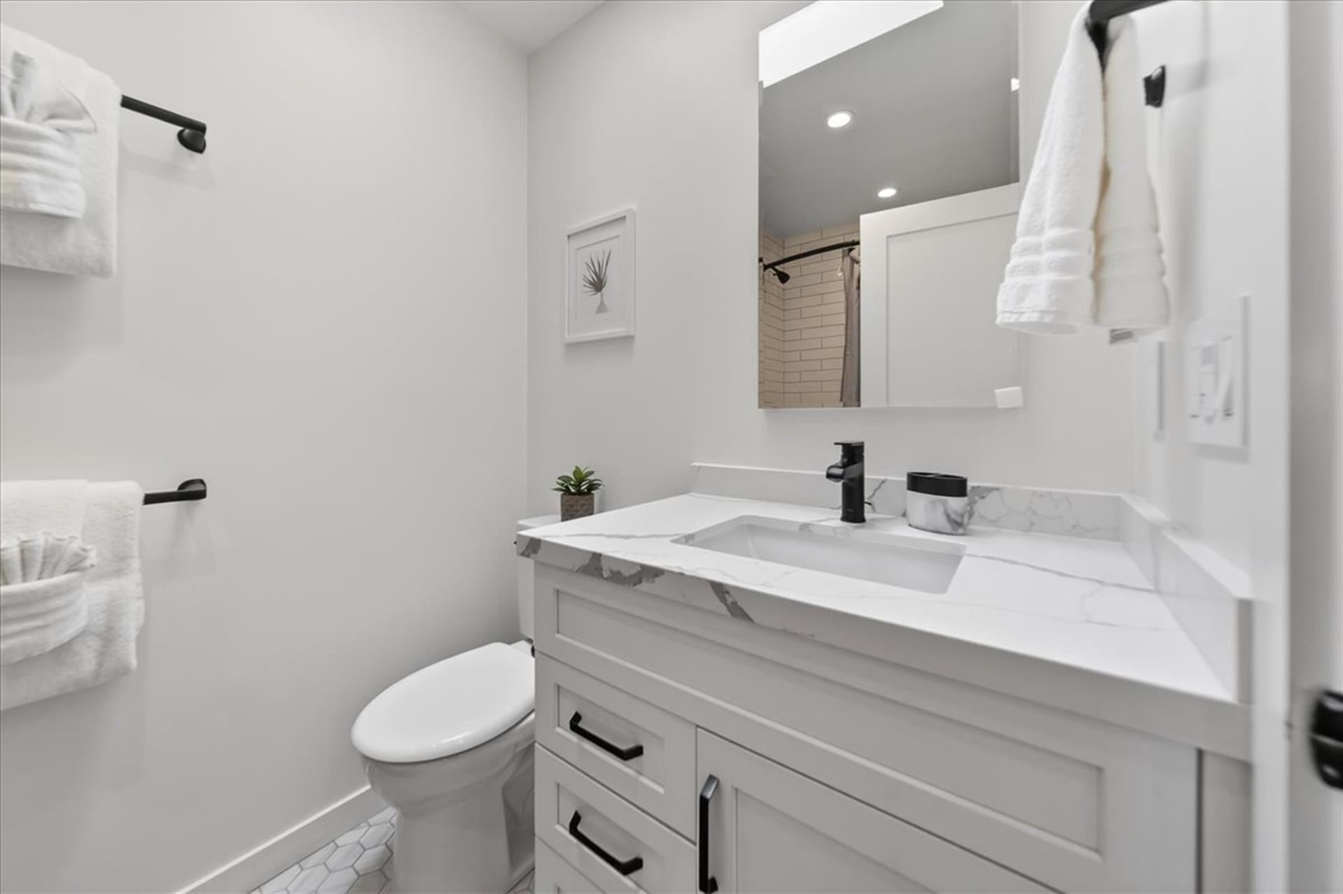 Full Hall Bathroom with ShowerOverTub