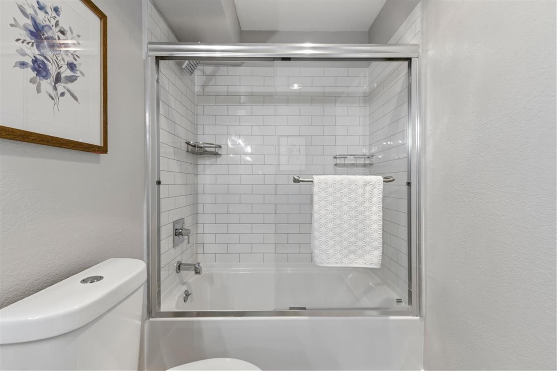 Hall Bathroom has a Shower Over Tub Combo