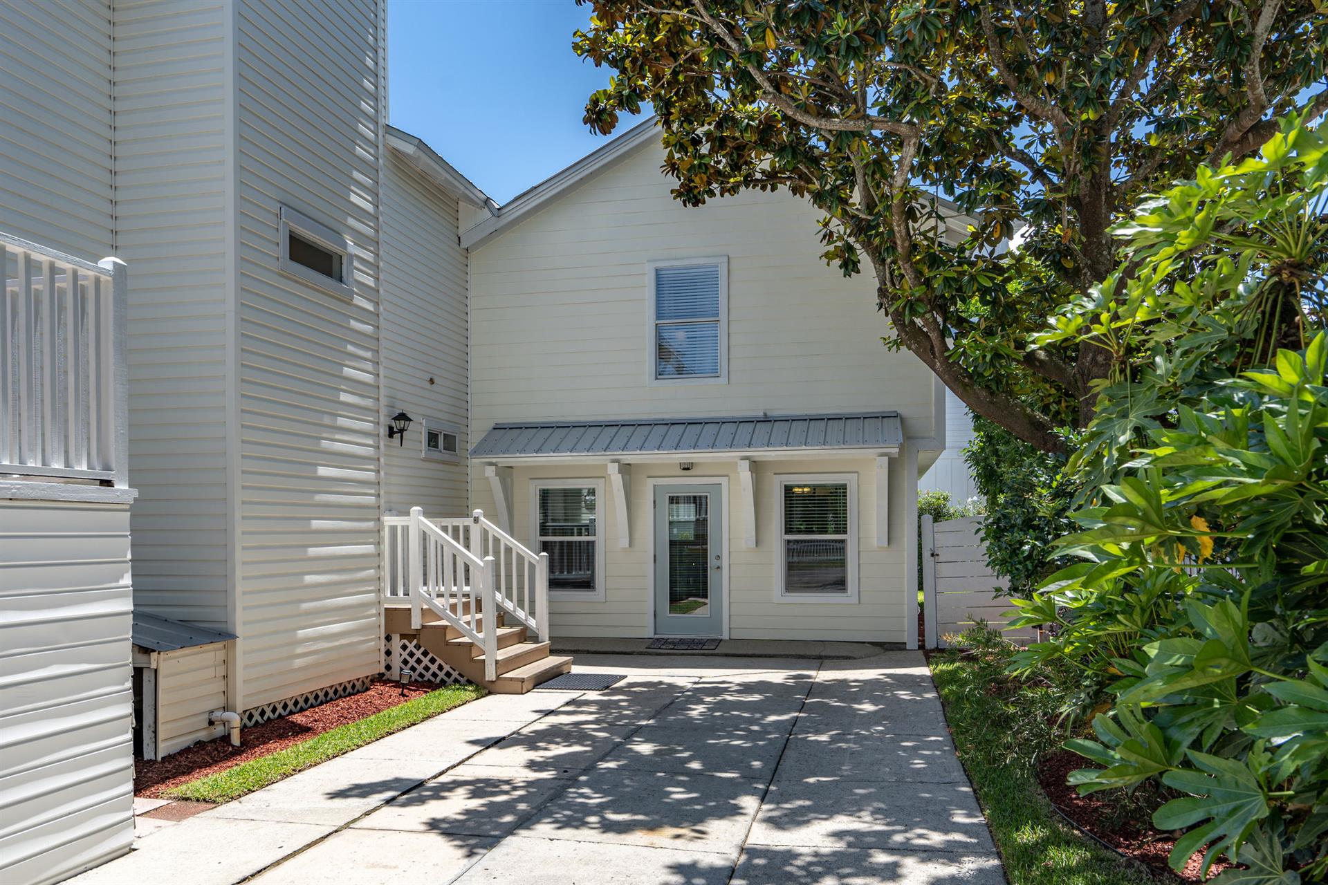 Bonus Room Entry into the two story guest house.   The second floor is accessed from the pool area and is separate from the first floor.