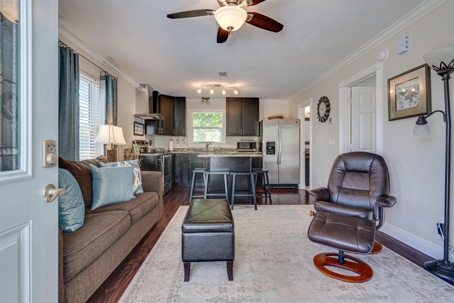 Top floor of the guest house is a separate apartment with full kitchen, living area with queen sleeper sofa, a king bedroom with full bath.