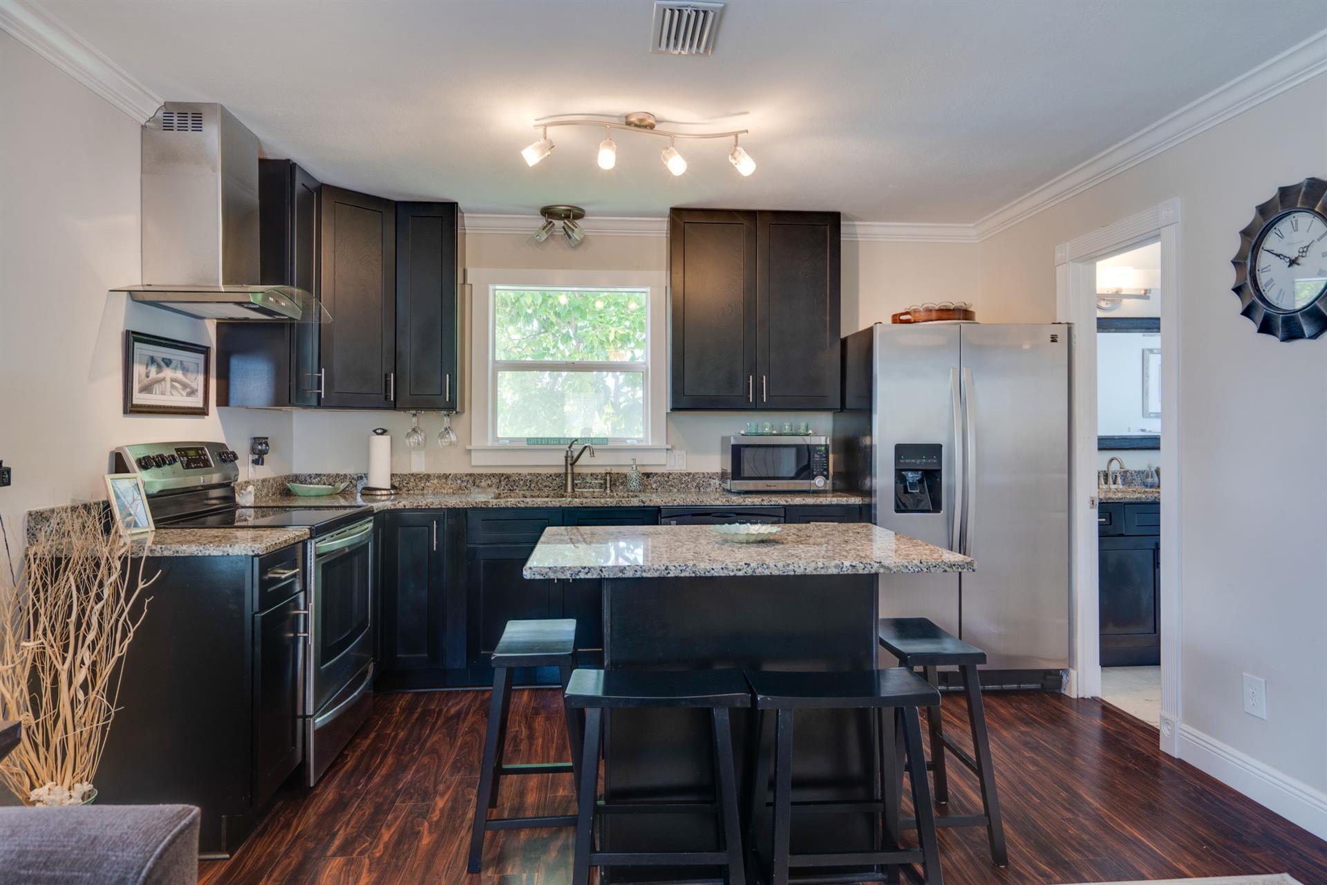 Fully stocked kitchen in the upstairs guest house.