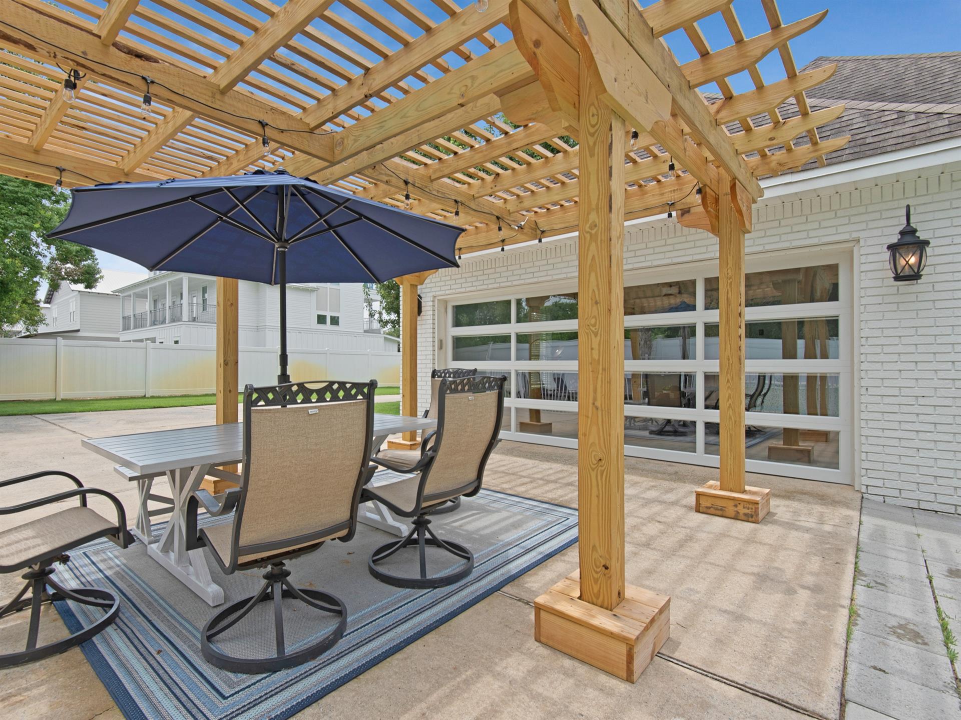 Pergola and Glass Garage Door