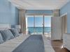 Primary Bedroom with King Bed and Private Balcony