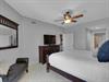 Primary Bedroom with King Bed and Flat Screen TV