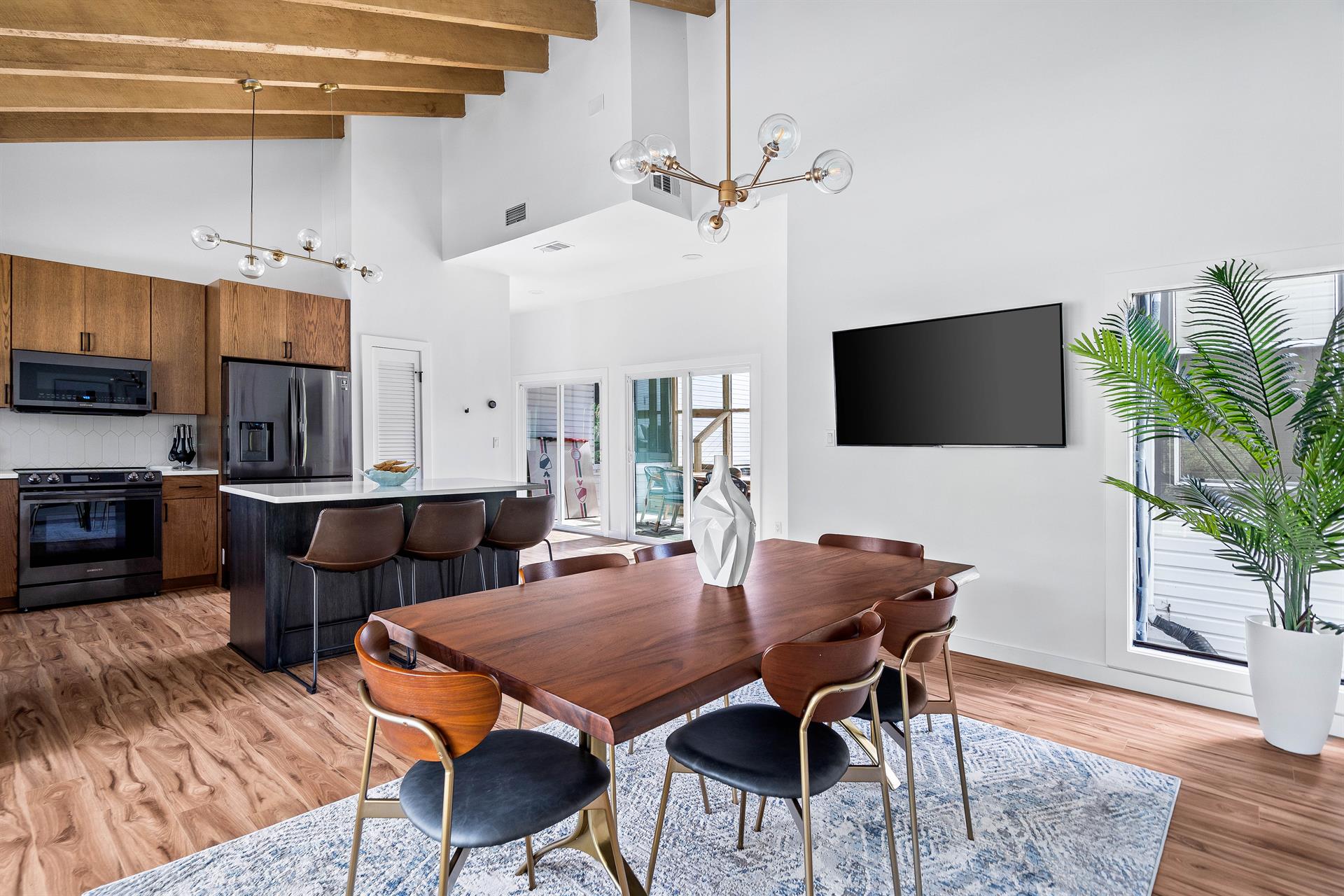 Dining Seating for 9 Including the Kitchen Island Seats with a 53 Smart TV