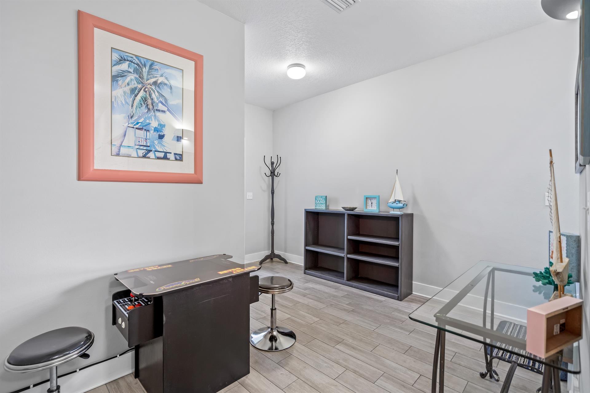 Game nook for the kids with a seated arcade with 412 games to choose from.