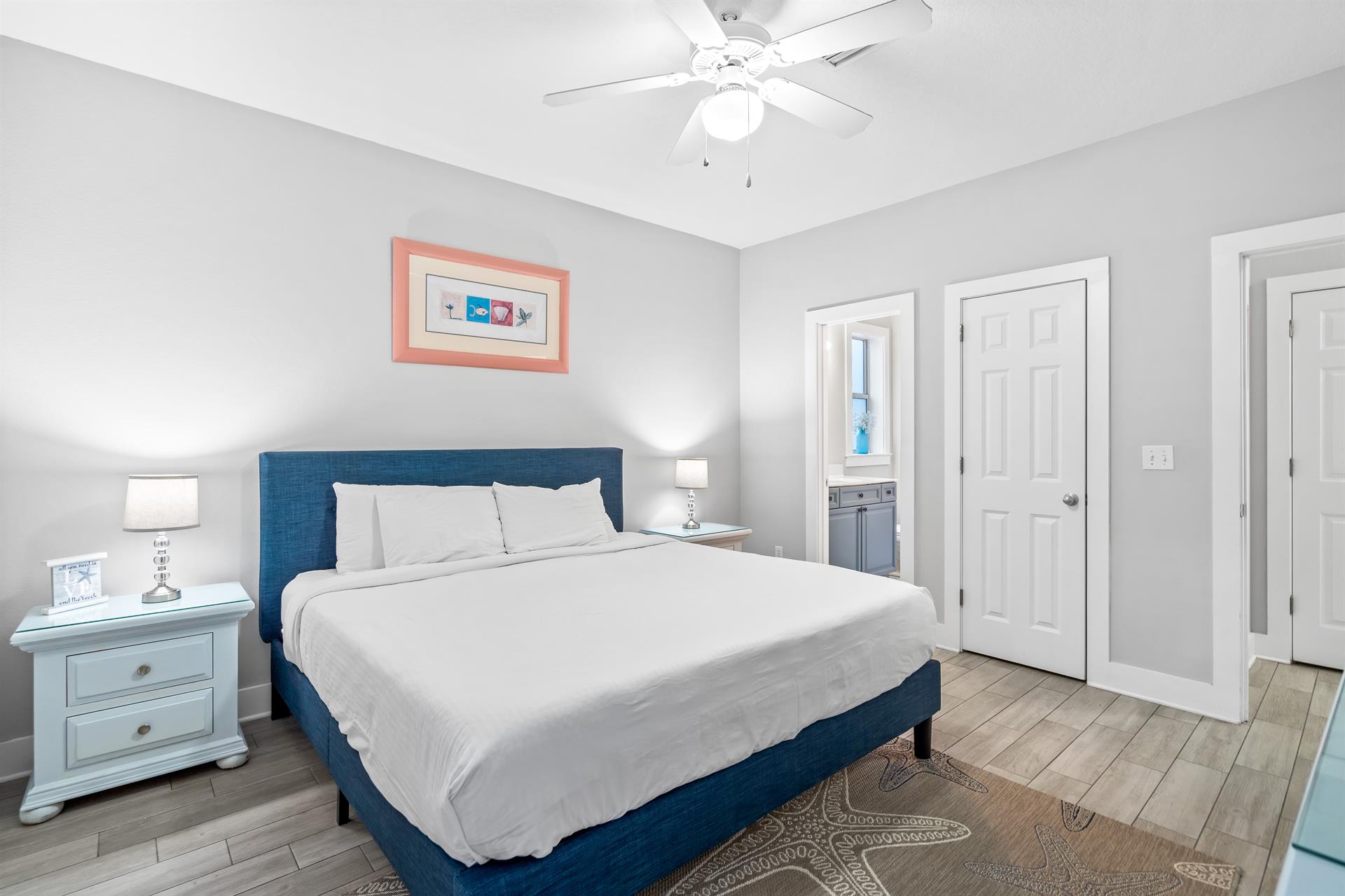 Another view of the first floor king bedroom showing  the direct access to the ensuite bathroom.