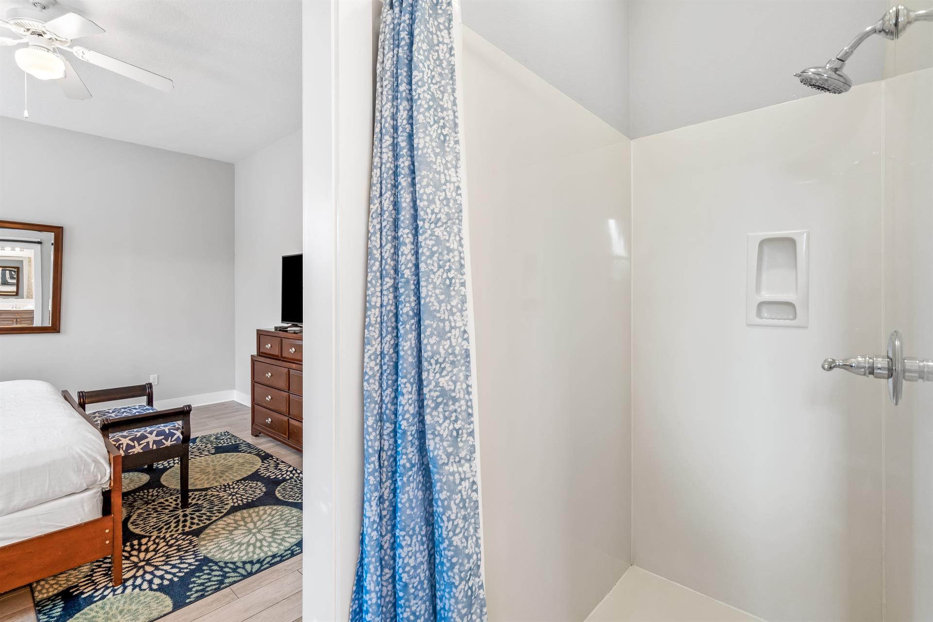 2nd floor ensuite bathroom for the primary king bedroom with double vanities, separate walkin shower,  soaking bathtub.