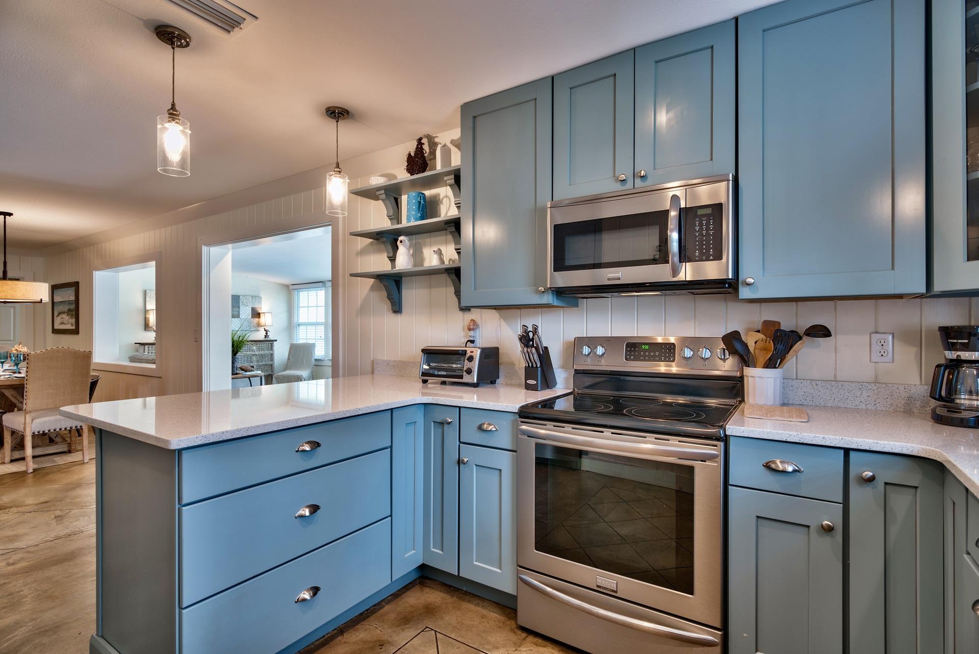 Fully Stocked Kitchen with Stainless Steel Appliances, Plenty of Cookware  Kitchenware,  Breakfast Bar.  Keurig and Drip Coffeemakers  Extra Toaster Oven