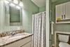 Full Bathroom for Double Queen Bedroom has a WalkIn Shower   a fullsize Washer  Dryer is also located in this bathroom.