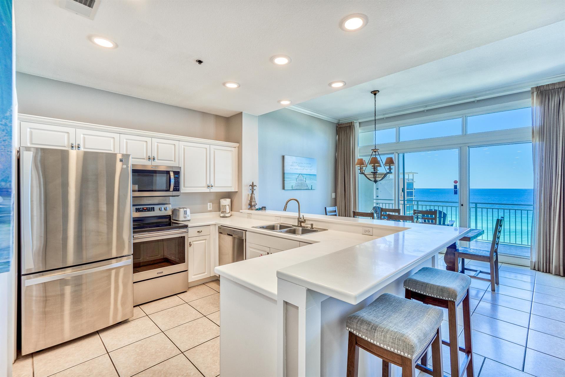 Fully Stocked Kitchen with Stainless Steel Appliances