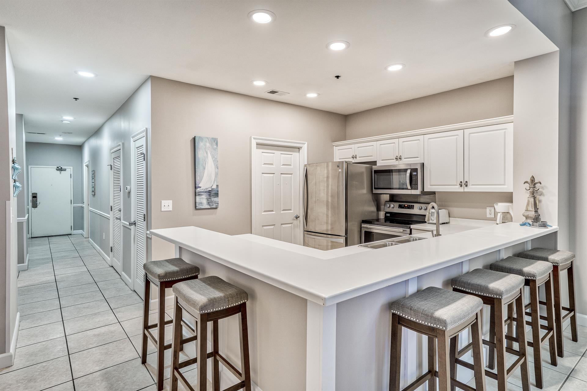 Fully Stocked Kitchen with Stainless Steel Appliances, Bar Seating for 6