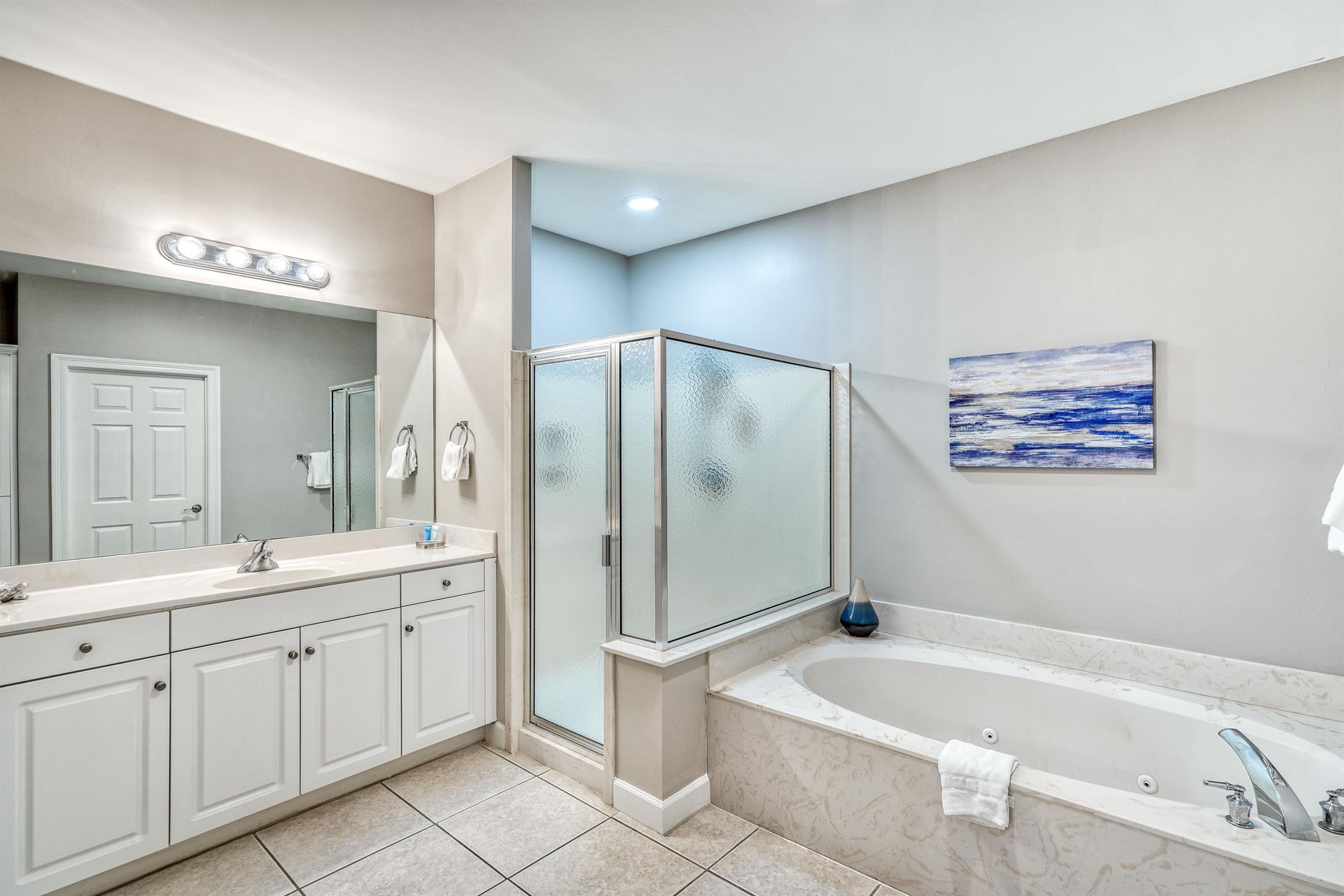 Master Bathroom with Soaking Tub and Walk In Shower