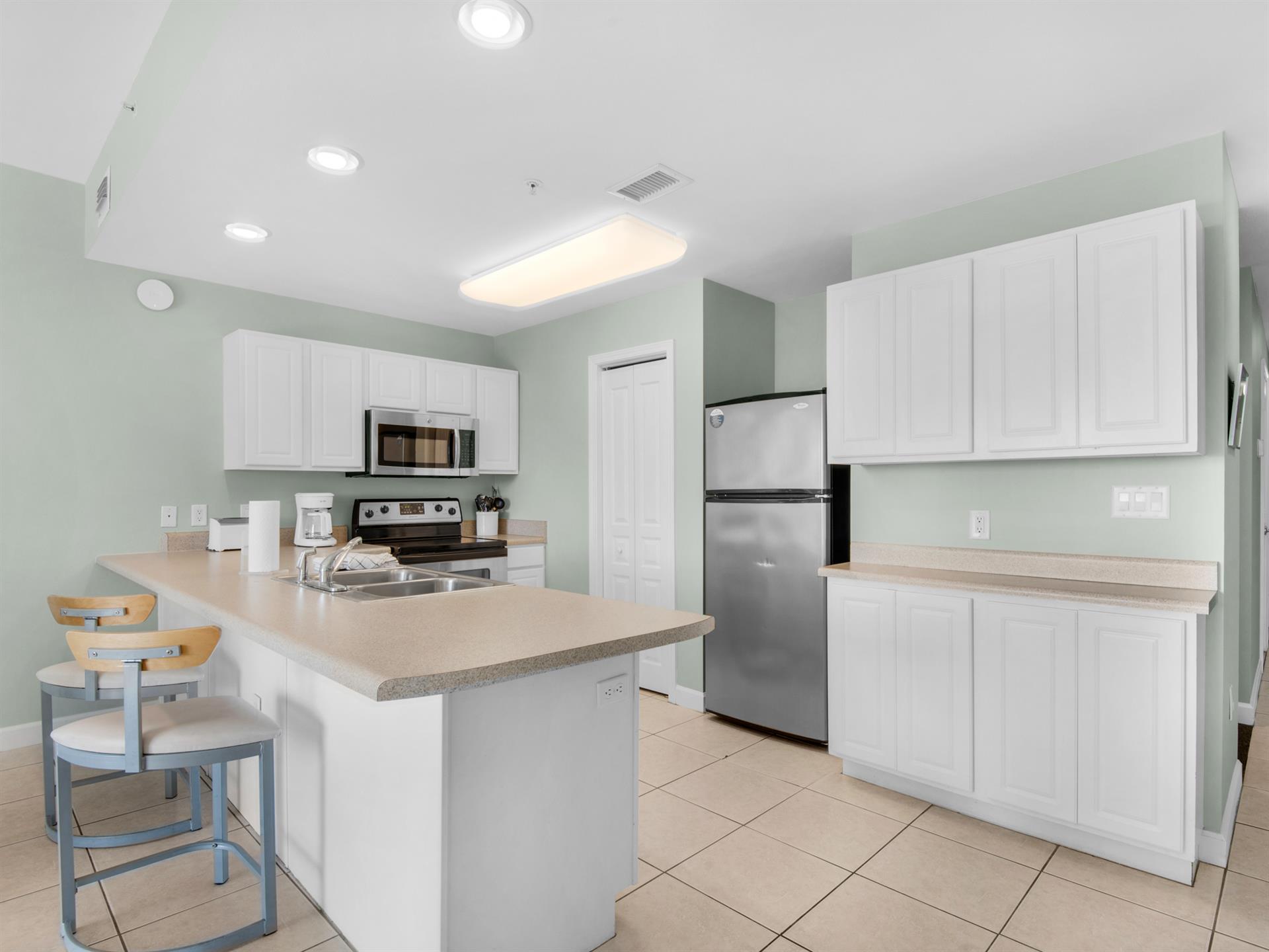 Kitchen with additional breakfast bar seating