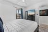 Primary Bedroom with Flat Screen TV