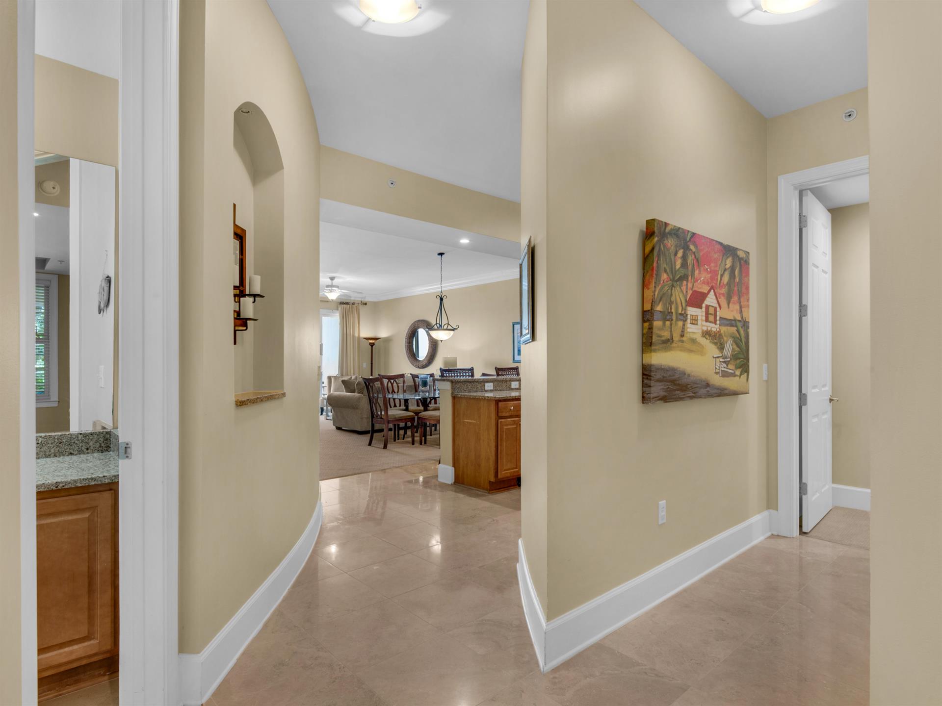 Half bath to the left, guest bedroom 2 to the right