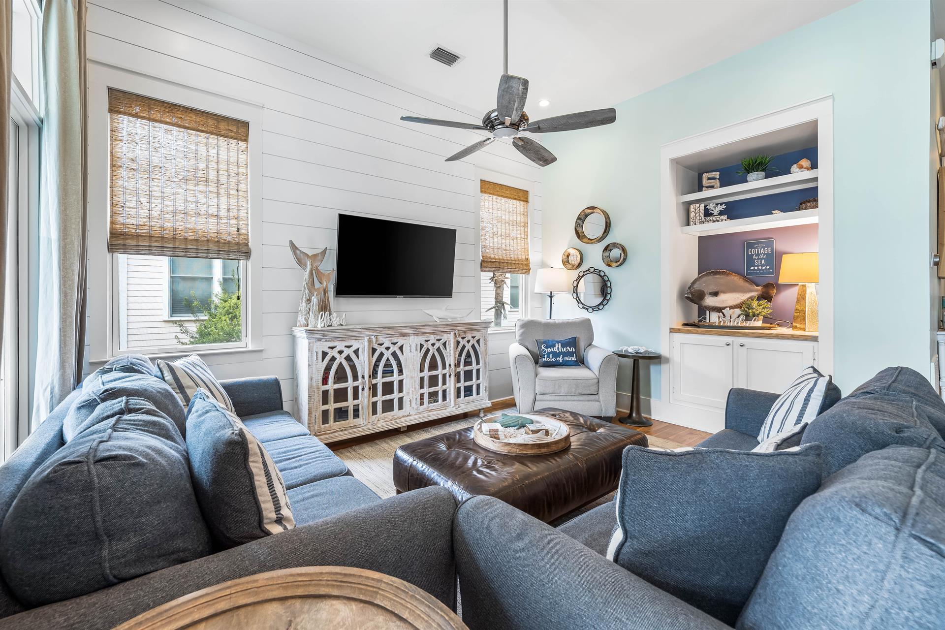 Lots of natural light from windows and the French doors that lead to the front porch of this onestory Frangista Beach home.