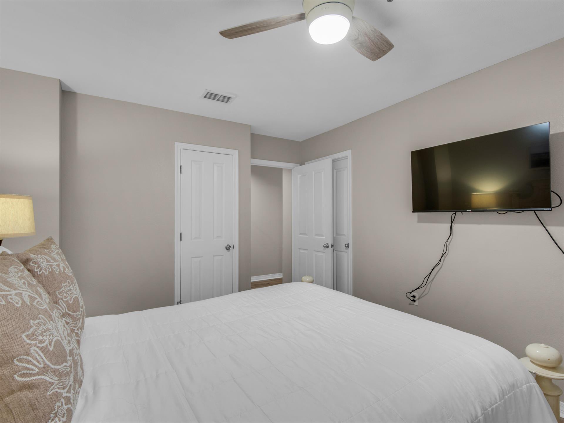 Bedroom 2 with Queen Bed and Flat Screen TV