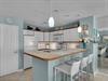 Kitchen with additional breakfast bar seating