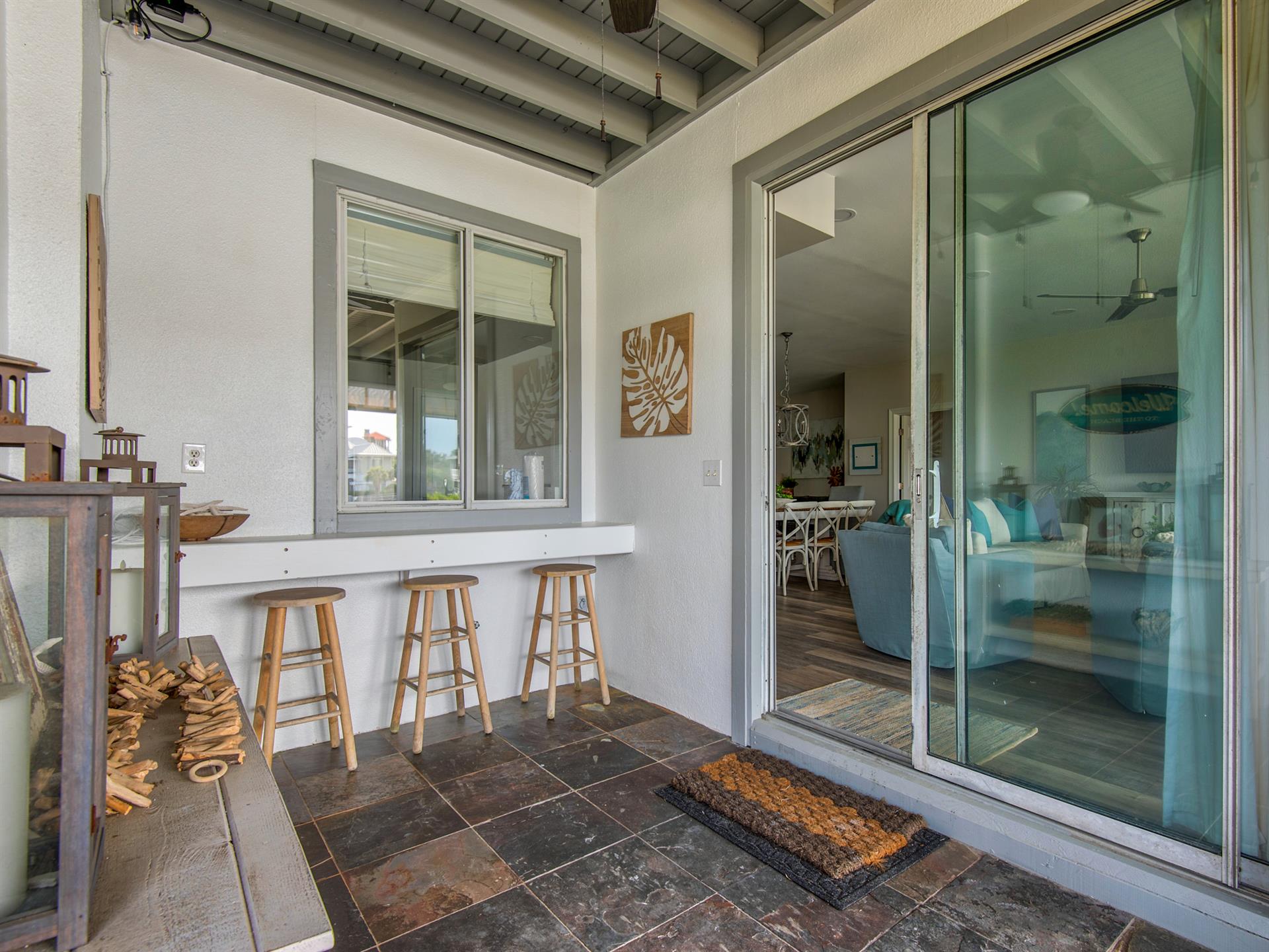 Patio bar seating with passthrough window
