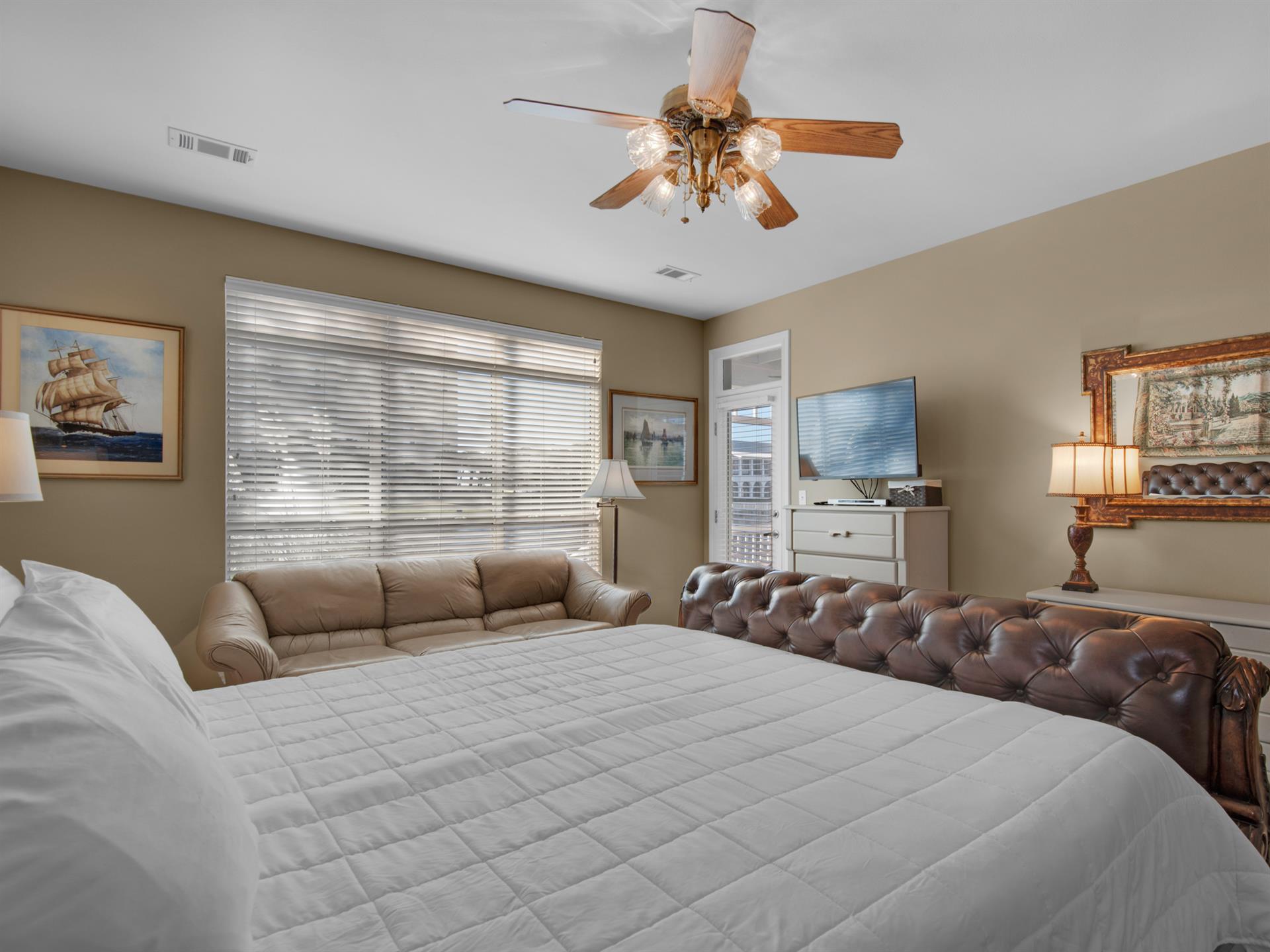 Flat Screen TV and Private Entrance to Porch from Primary Bedroom