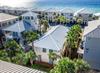 Glimpses of the Gulf from one of the large covered porches, private beach access and community pool