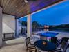 Outdoor Covered Area off Kitchen Overlooking Pool