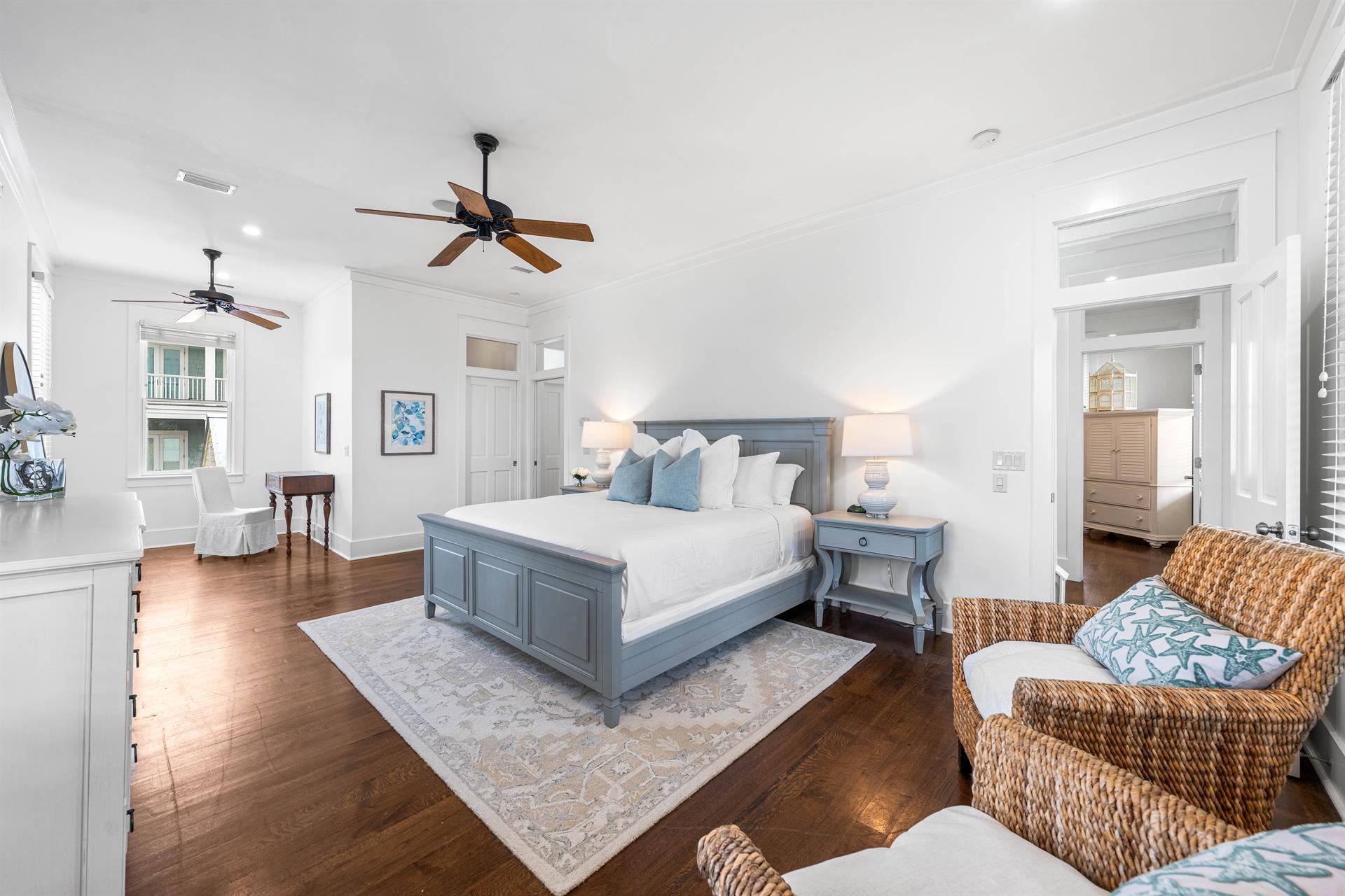 2nd Floor Primary Bedroom with King Bed, 40 YouTube TV, Desk, Walkin Closet, Ensuite Full Bathroom with Separate Soaking Tub, Walkin Shower, Double Vanities,  Access to the Covered Balcony with Bistro Tables.