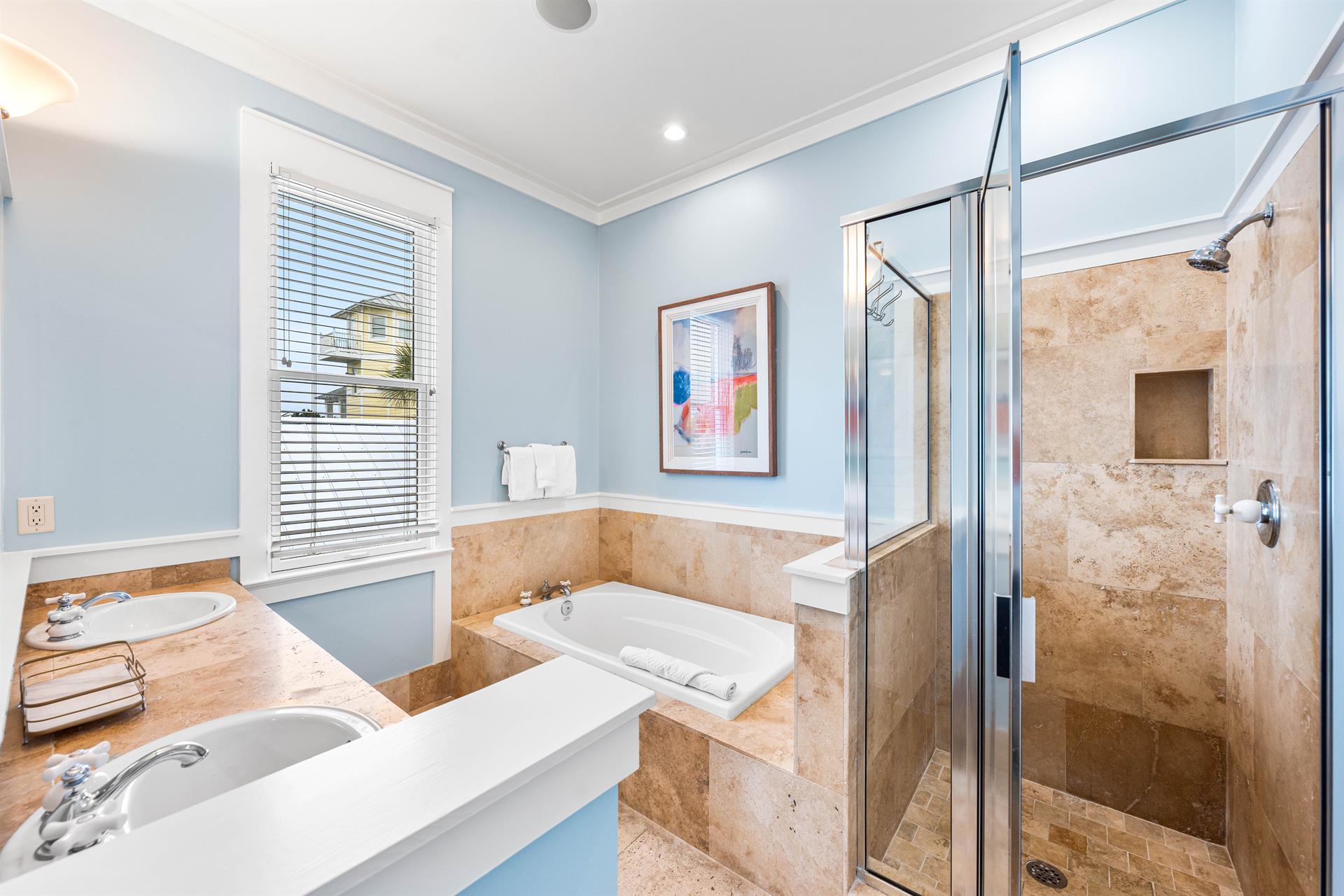 Primary Ensuite Bathroom for the King Bedroom has Soaking Tub, WalkIn Shower, Double Vanities,  Water Closet.