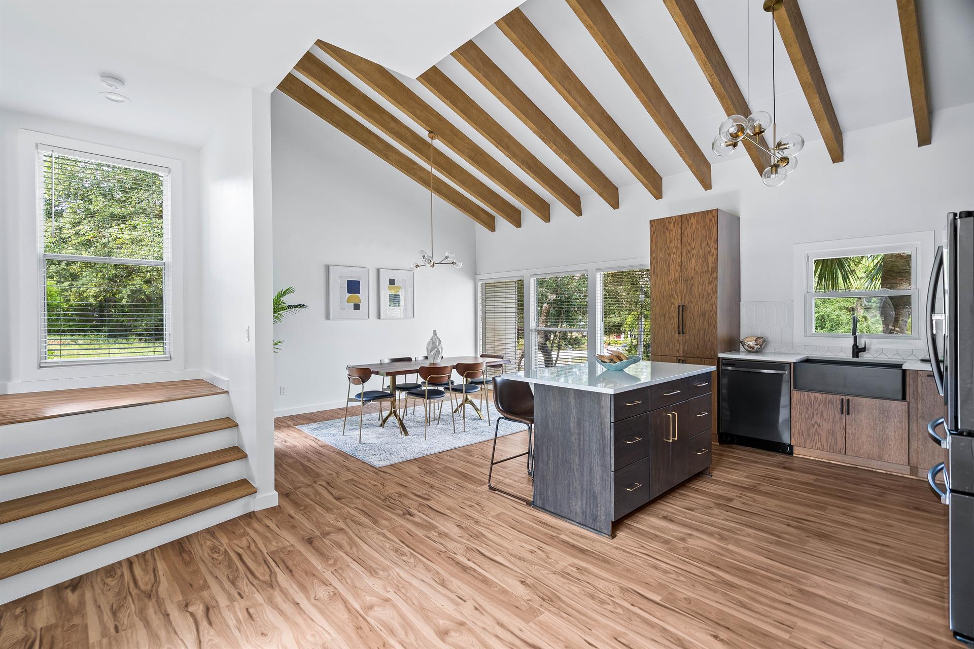 Stairs leading to the primary king bedroom and bunk room.