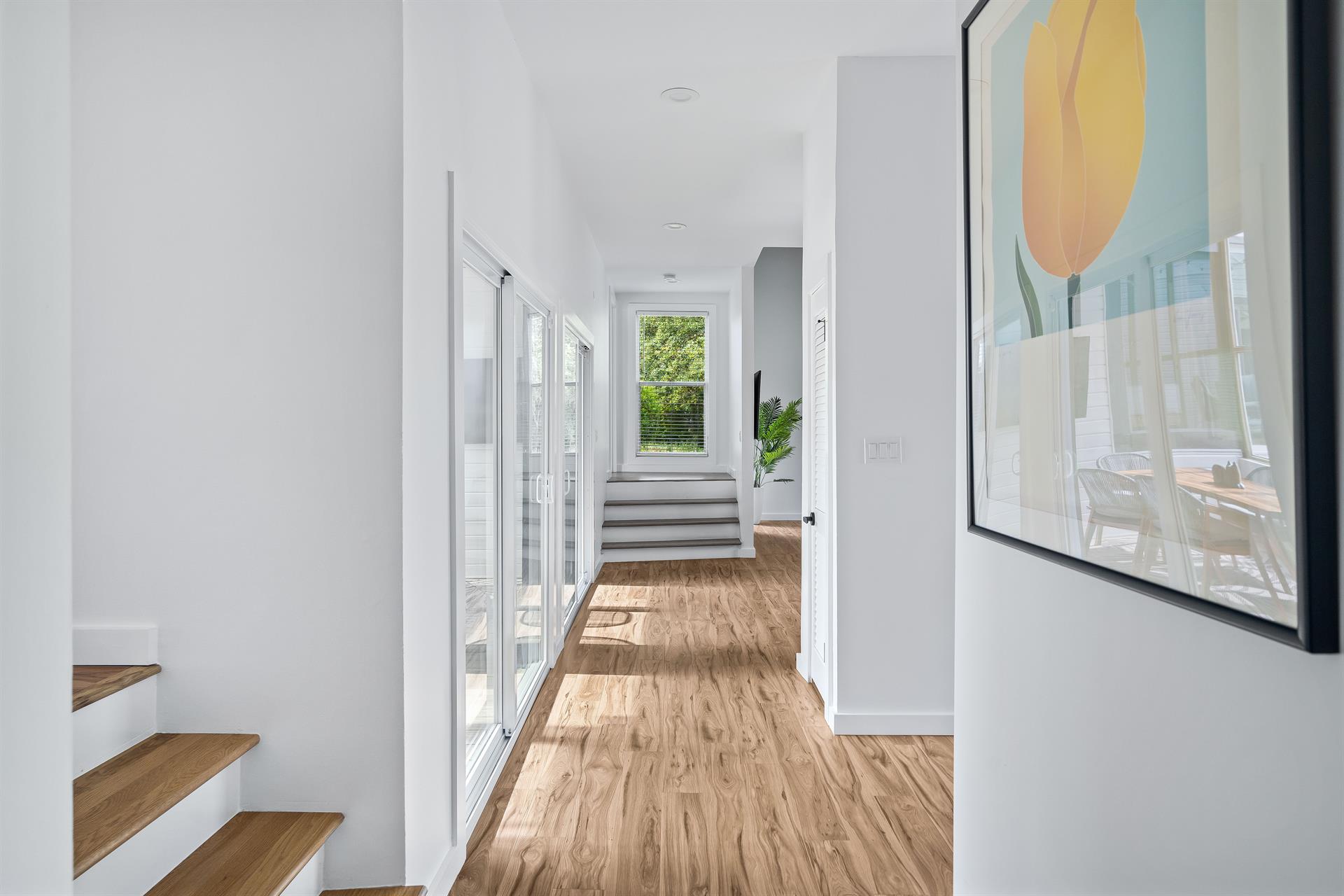 To the left are stairs leading to the two guest bedrooms