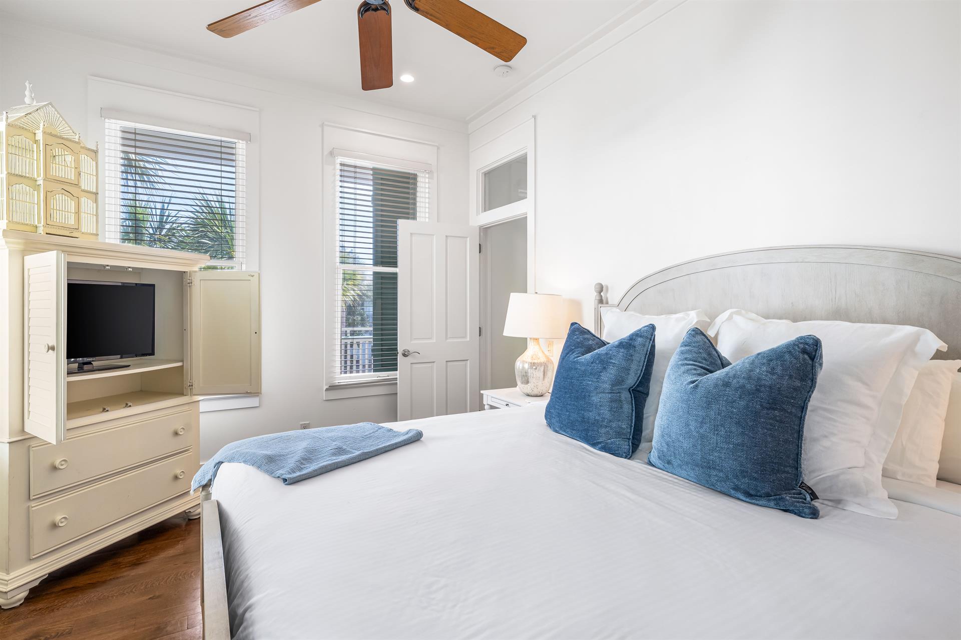 2nd Floor Bedroom with King Bed, 32YouTube TV inside the Armoire, Ensuite Bathroom  Access to the Outdoor Balcony facing the Gulf.