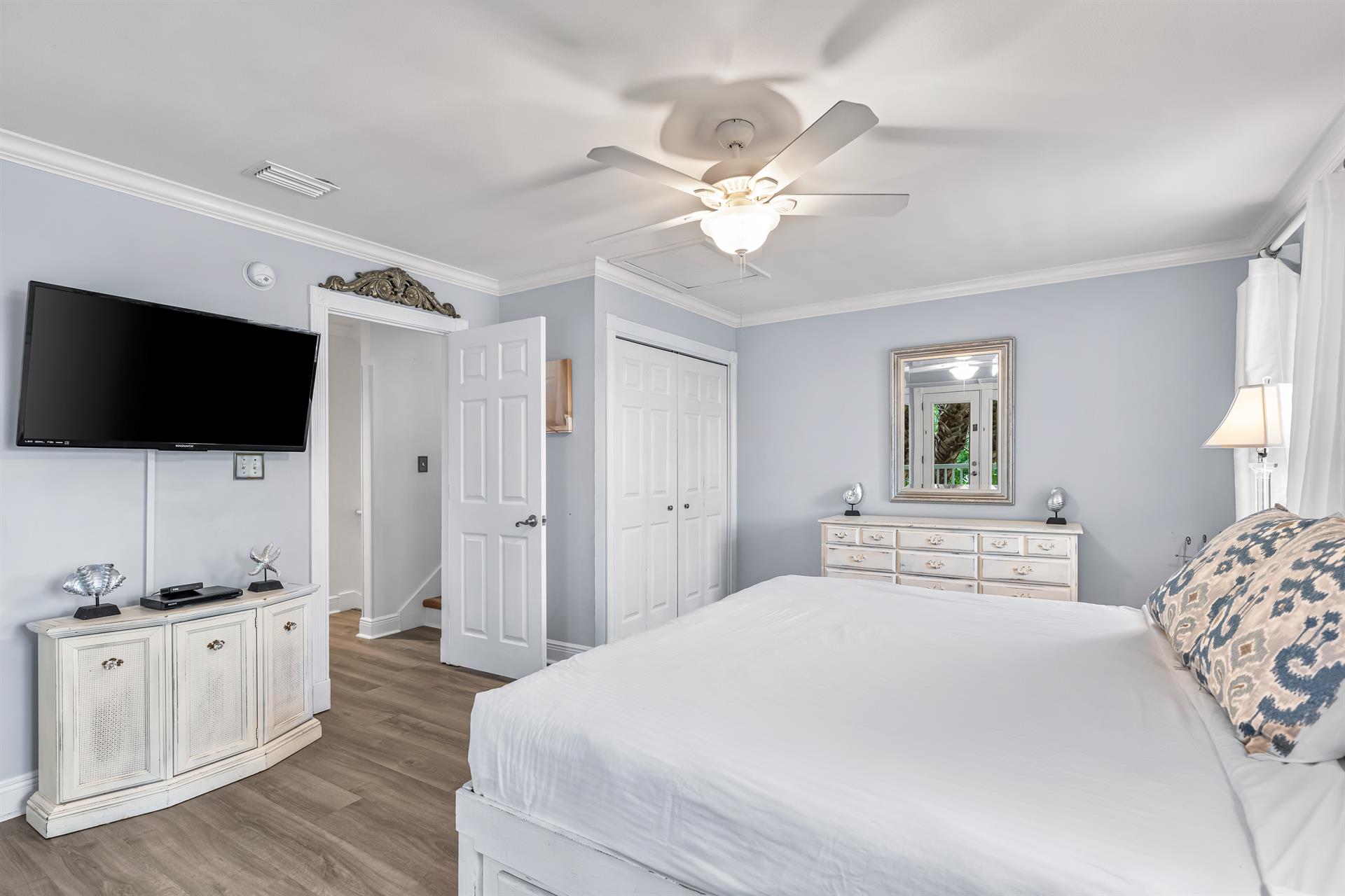 2nd floor King Bedroom 3 is the primary bedroom suite on the second floor with 42 smart tv, balcony access and ensuite bathroom.  Bonus minirefrigerator with coffee setup.