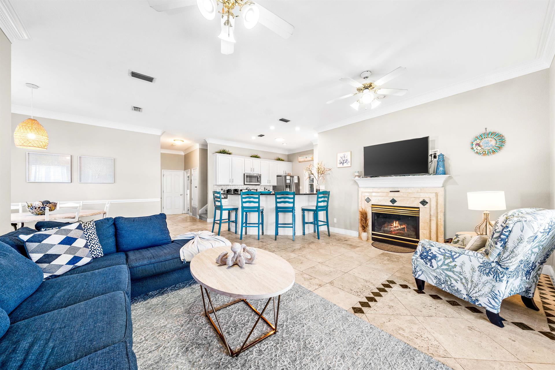 Open Living Room, Kitchen and Dining Area with 55 Smart TV with Cable.