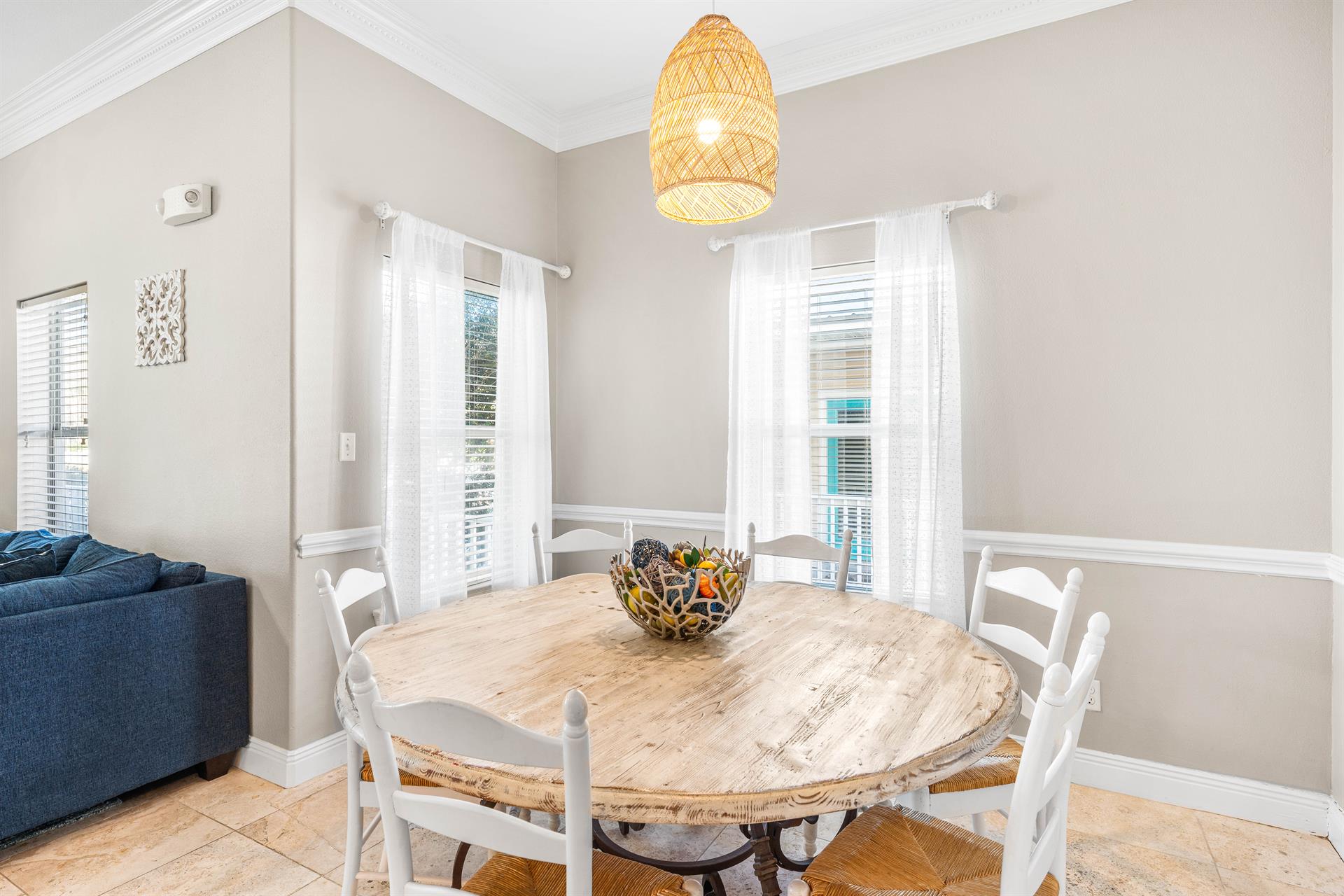 The round dining table makes conversation more enjoyable