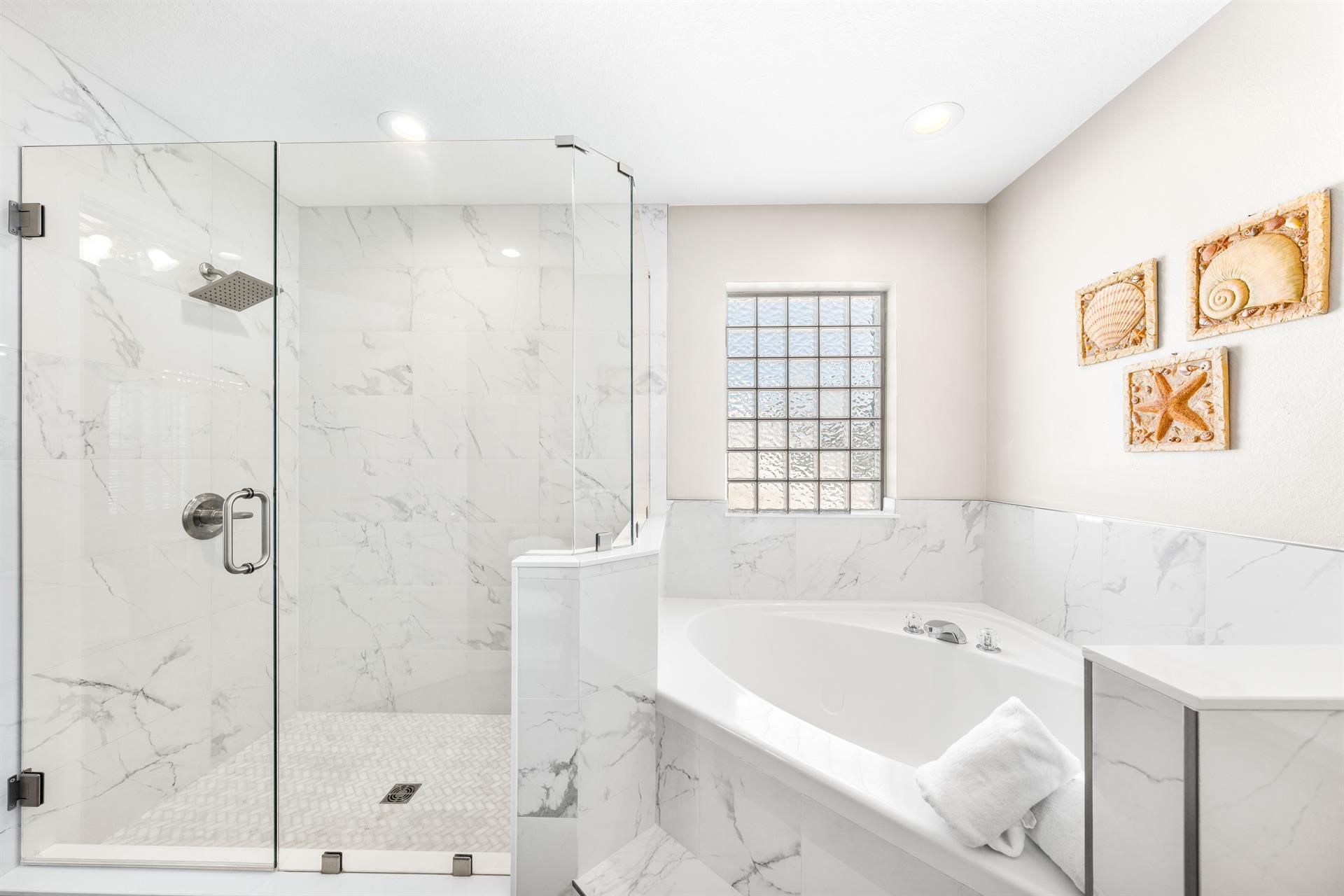 Primary ensuite bathroom is quite spacious and has a separate toilet area.