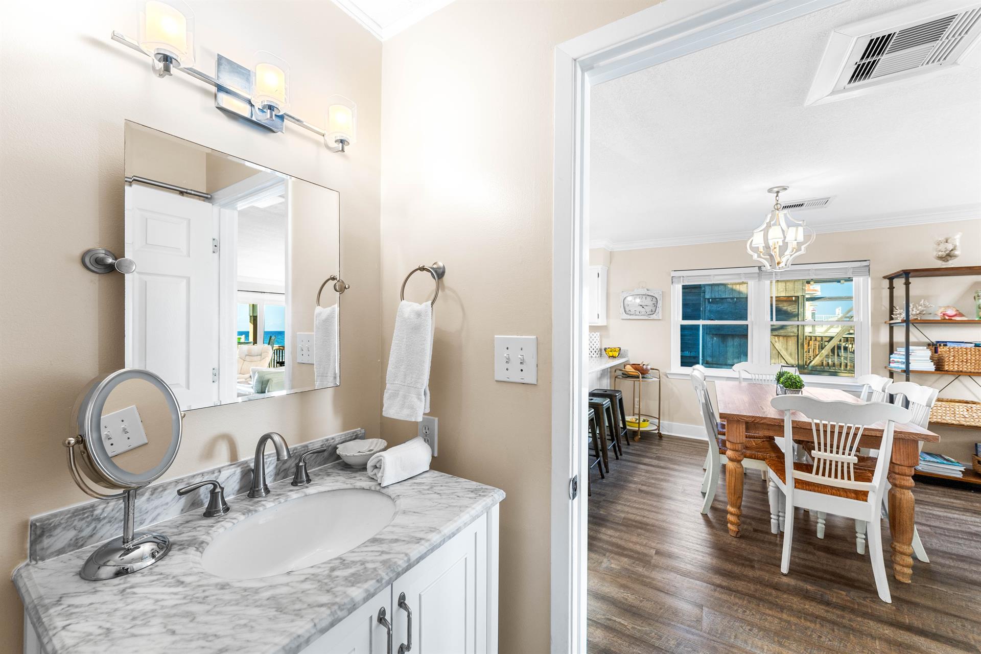 Convenience level unlocked—a stylish half bath with a full size washerdryer