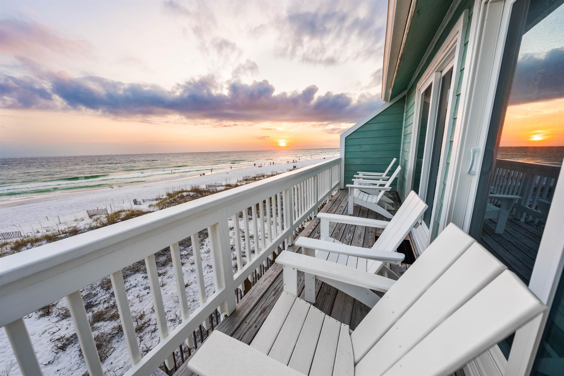 Youve got the best seat in the house on the second floor beachfront balcony   Sunsets included.